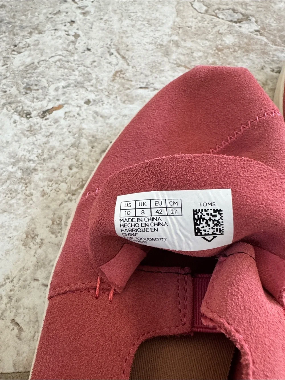 TOMS Women's Slip on sneaker style in Rust colored Red Suede